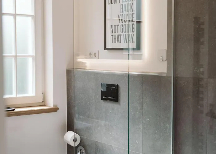 Am Stadtpark - Boardinghouse 公寓式酒店 居特斯洛